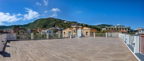 a large balcony with a view of a city at Hotel Angelina in Sant'Agnello