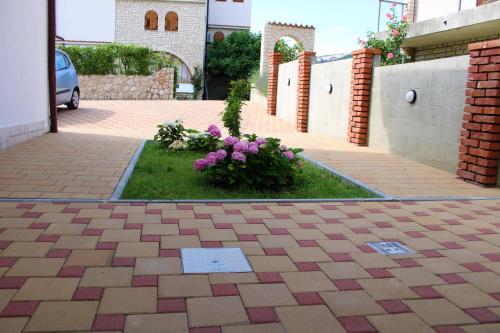 Φωτογραφία από το άλμπουμ του Apartmani B&S σε Barbat na Rabu