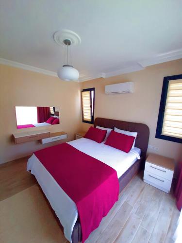 Ένα ή περισσότερα κρεβάτια σε δωμάτιο στο Gocek Arion Hotel