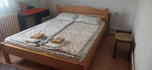 Postel nebo postele na pokoji v ubytování Kuća za odmor Ema