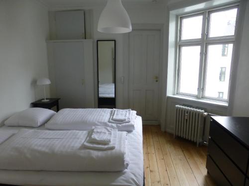 מיטה או מיטות בחדר ב-Nørre Farimagsgade