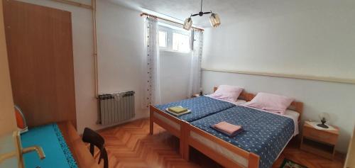 Posteľ alebo postele v izbe v ubytovaní Apartments Jurić - 4 An apartment for 3 in the center