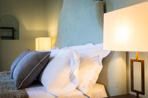 Letto o letti in una camera di Villa Masetta - Luxury Suites