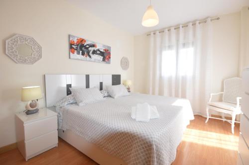 A bed or beds in a room at Casa Liss