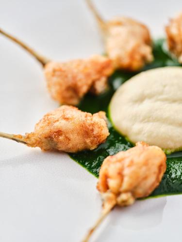 a close up of some food on a plate at Relais Bernard Loiseau in Saulieu