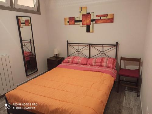 Ένα ή περισσότερα κρεβάτια σε δωμάτιο στο La casa sul lago
