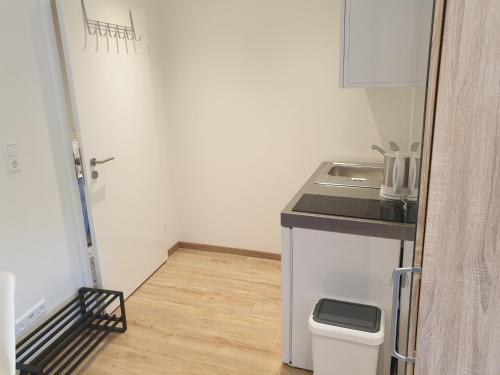 Η κουζίνα ή μικρή κουζίνα στο Steinhuder Ferienwohnung am Meer