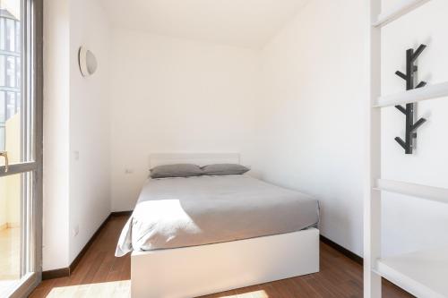 Ένα ή περισσότερα κρεβάτια σε δωμάτιο στο Alessia's Flat - Affori