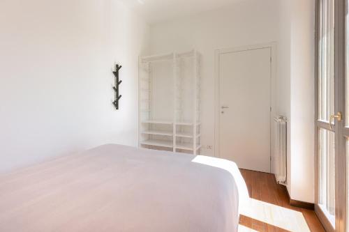 Ένα ή περισσότερα κρεβάτια σε δωμάτιο στο Alessia's Flat - Affori