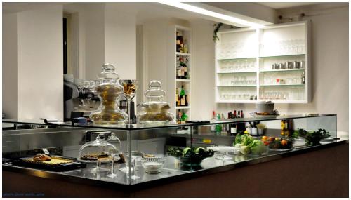 a kitchen with a counter with food on it at Il Caminetto Montefiascone in Montefiascone
