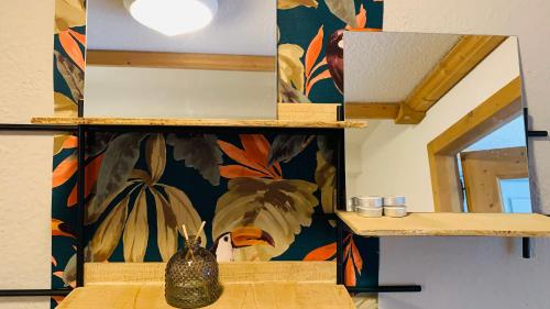 a bathroom with a shelf with a vase on the counter at Appartement vue Montblanc 5mn piste1 in Les Houches