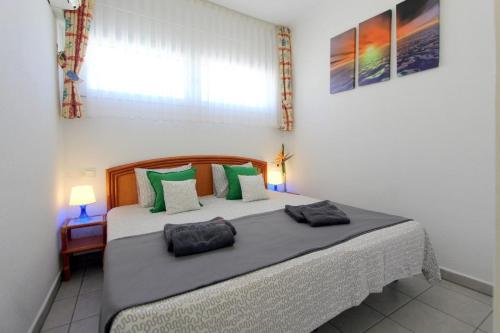A bed or beds in a room at LEON INMO Apartment Elen - 10417