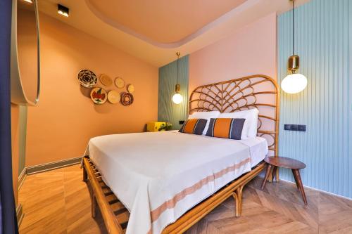 a bedroom with a large bed in a room at Luff Boutique Hotel - Adult Only in Kas
