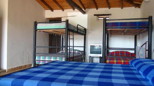 Postel nebo postele na pokoji v ubytování Finca Casa Loma Barichara