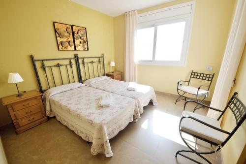 Ένα ή περισσότερα κρεβάτια σε δωμάτιο στο Villa Reggia