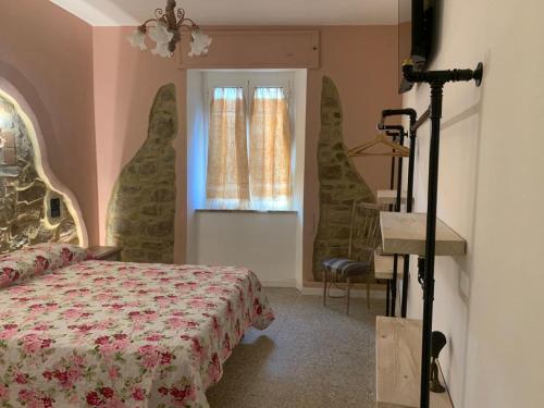 Postel nebo postele na pokoji v ubytování Affittacamere Nonna Nana