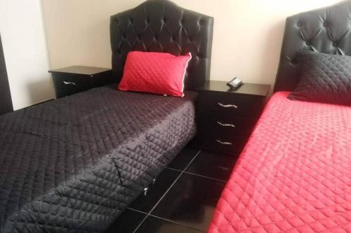 Ένα ή περισσότερα κρεβάτια σε δωμάτιο στο Apartamento acogedor con Piscina Excelente Sector