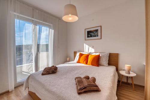 Giường trong phòng chung tại Rock Apartments