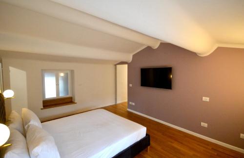 Uma cama ou camas num quarto em Room Verona Ai Conti
