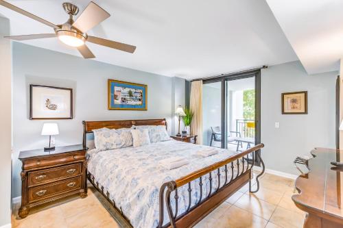a bedroom with a bed and a ceiling fan at Shipwatch C-116 in Isle of Palms
