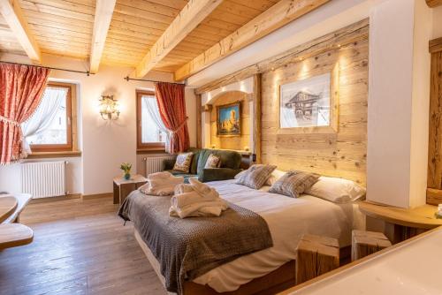 Postel nebo postele na pokoji v ubytování Ciandolada Wellness