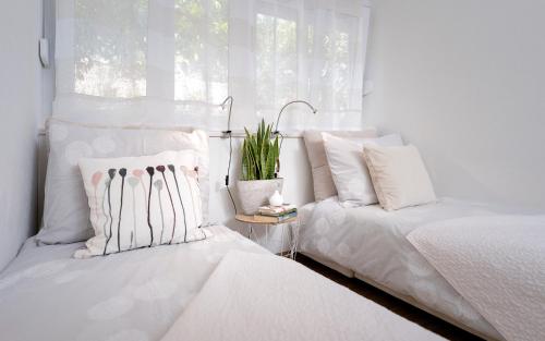 En eller flere senge i et værelse på Smart & Cozy - ZF Hvar