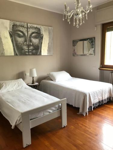 Postel nebo postele na pokoji v ubytování Gerry Home
