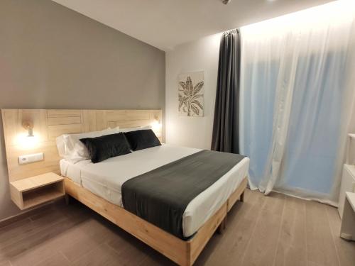 Krevet ili kreveti u jedinici u objektu GLOBAL Apartments & Rooms