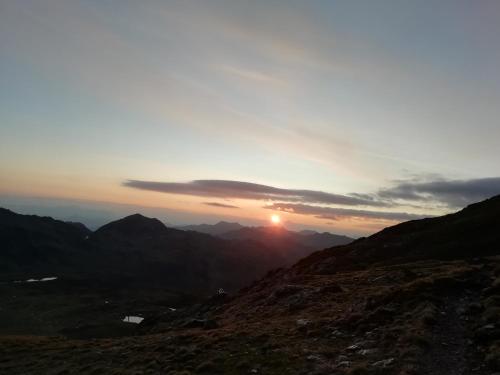 a sunset from the top of a mountain at Apartement Flörl in Rohrberg