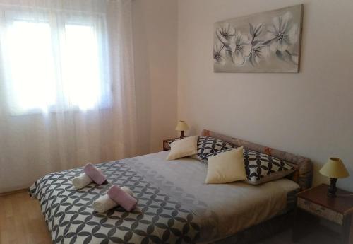 Postel nebo postele na pokoji v ubytování Apartment Sandra