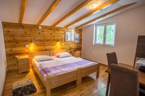 Cama o camas de una habitación en Apartments Grbović