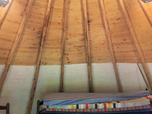 a ceiling of a room with wooden beams at 6 person holiday home in ÅSARP-By Traum in Åsarp