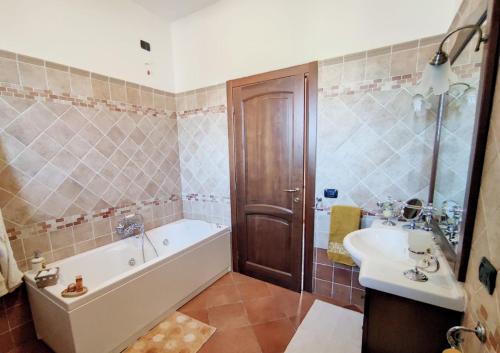 Ванная комната в Villa Sargheruoli