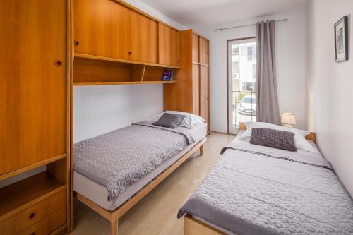 Postel nebo postele na pokoji v ubytování Miha Poreč