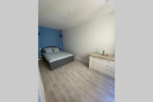 Кровать или кровати в номере Appartement très spacieux & Coupery