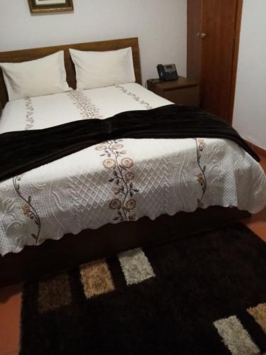 Katil atau katil-katil dalam bilik di Reguengos Hotel
