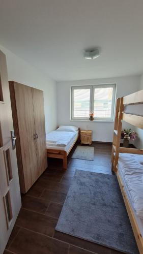 Ένα ή περισσότερα κρεβάτια σε δωμάτιο στο Kajula