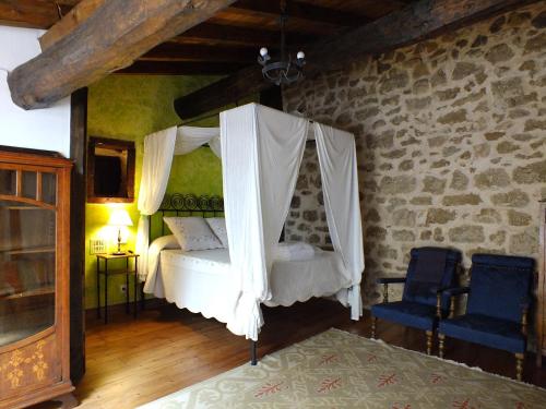 מיטה או מיטות קומותיים בחדר ב-La Bodeguita