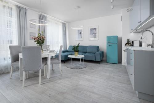 Kuchyňa alebo kuchynka v ubytovaní Apartament Pastelowa Portova