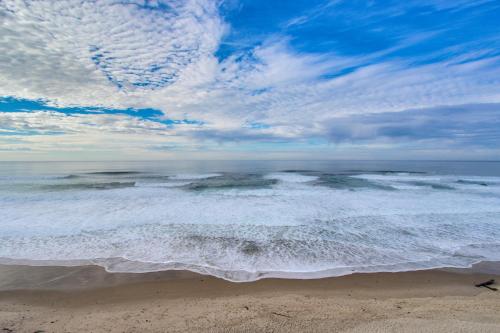 a view of the beach with a heart in the sky at The Turtle Nest in Lincoln City
