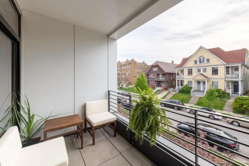 a balcony with a view of a city at East Side Luxury 1BR Apt - Near Brady St with Balcony and Lounge - Sleeps 4 in Milwaukee