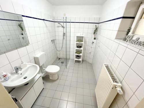 ห้องน้ำของ Ferienwohnung Blickfang - Modernes Apartment direkt in der Altstadt von Erfurt mit Balkon - beste Lage und Aussicht