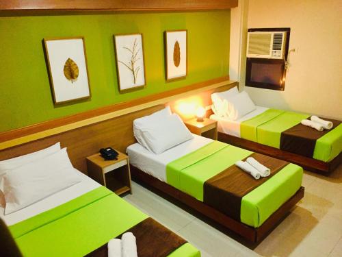 Foto da galeria de RedDoorz Plus @ ABC Landmark Hotel em Kidapawan