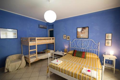 Postel nebo postele na pokoji v ubytování B&B Miroca