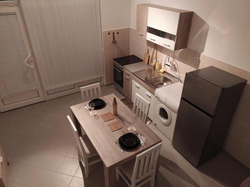 Ett kök eller pentry på Apartman Todorovic