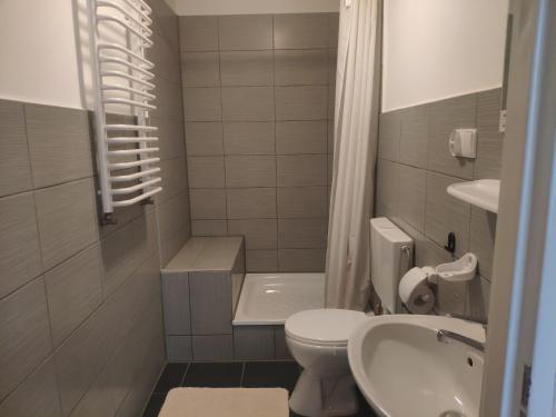 Ванна кімната в Pokoje i Apartamenty u Anny