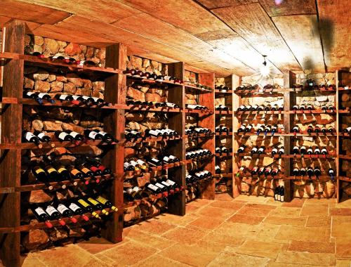 a room filled with lots of wine bottles at Parador Lumiar Boutique Hotel & Spa in Lumiar
