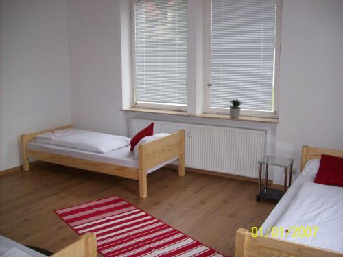 Posteľ alebo postele v izbe v ubytovaní Ferienwohnung Lamm