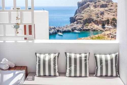 a room with a view of the ocean at Lindian Polis in Lindos