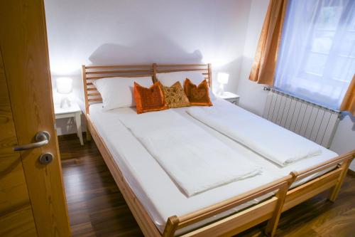 Un pat sau paturi într-o cameră la Schrotthof